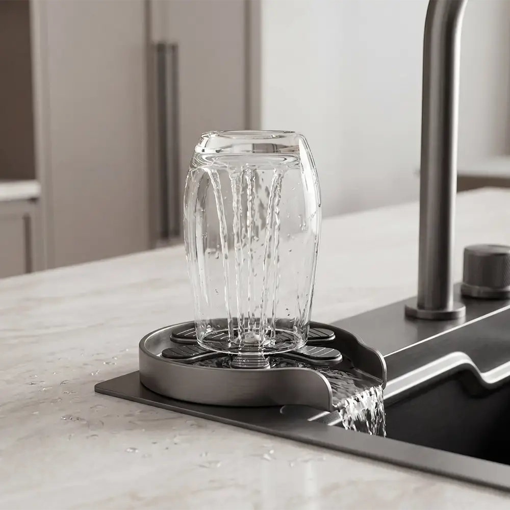 Glass cleaner is cleaning the glass, face down, water shooting upwards