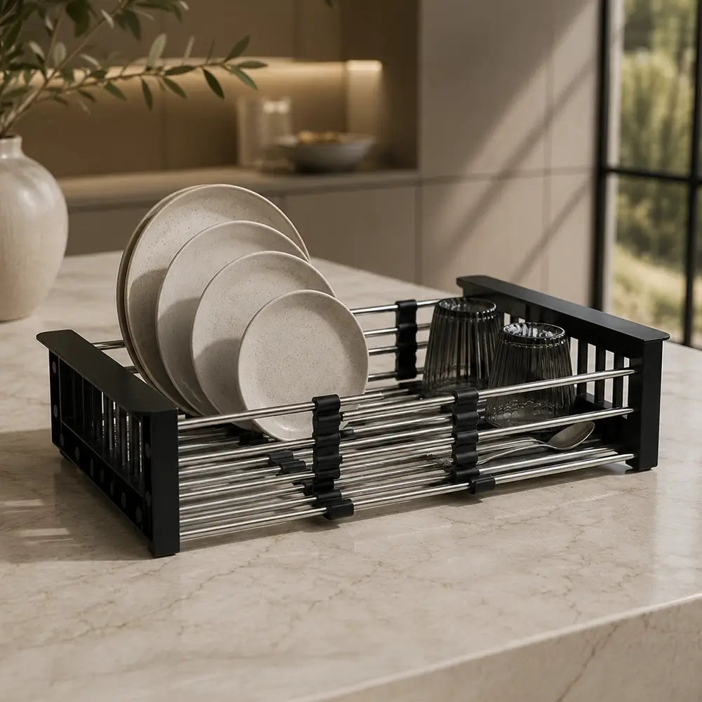 Dish rack with plates and cups on a kitchen counter